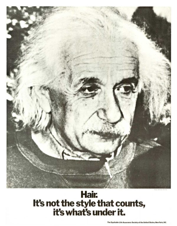 Original 1960s Einstein inspirational poster with black and white photograph of Einstein with messy hair and text "It's not the style that counts, it's what's under it."