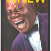 Poster image featuring Louis Armstrong laughing in a bold WNEW AM 1130 style layout, with “WNEW” in large yellow letters at the top, “AM 1130” across the upper area, and “BLESSED WITH AMERICA’S BEST” shown near the bottom in the artwork’s multicolor design.