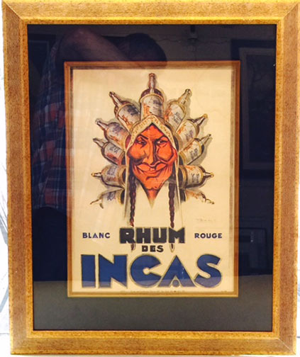Original 1928 Rhum des Incas vintage French liquor poster by G. Poduie featuring Native American with rum bottle headdress, rare format lithograph, framed with gold frame and mat, Grade B+ condition