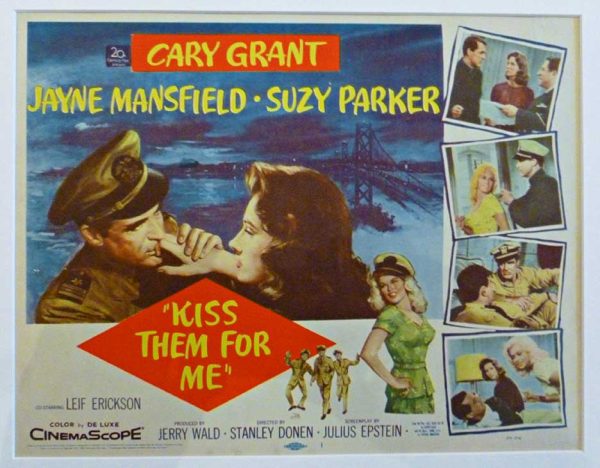 Vintage lobby card with large title text “KISS THEM FOR ME,” featuring a scene with Cary Grant and Jayne Mansfield, and actor names at the bottom including “Cary Grant,” “Jayne Mansfield,” “Leif Erickson,” “Suzy Parker,” and “Ray Walston.”
