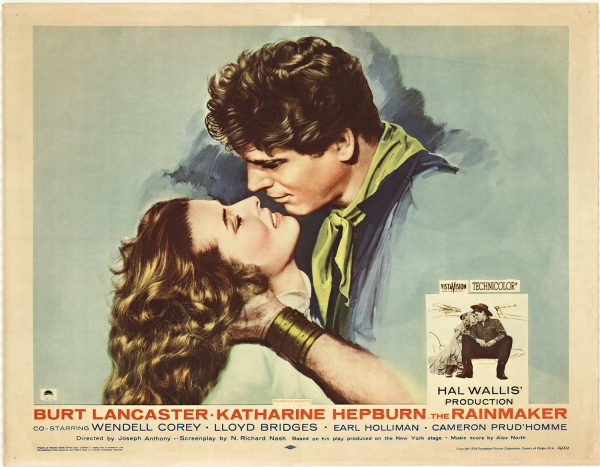 The Rainmaker (1956) original half sheet movie poster (28" x 22") featuring Katharine Hepburn and Burt Lancaster in a romantic embrace, studio-issued