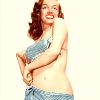 Authentic 1953 Marilyn Monroe door-panel poster, original life-size pin-up in blue-and-white striped bikini, looking over her shoulder.