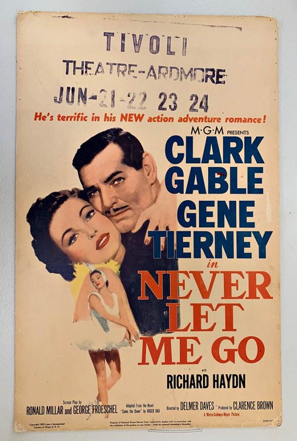 Vintage U.S. lobby card for NEVER LET ME GO, showing Clark Gable and Gene Tierney in a romantic studio pose, with cast details and film title text displayed prominently.