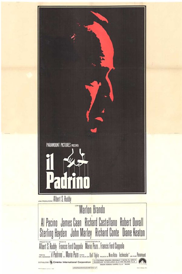 972 Il Padrino (The Godfather) Italian 2-foglio poster featuring a dark vertical design with a red-shadowed face and the iconic puppet-hand logo below.