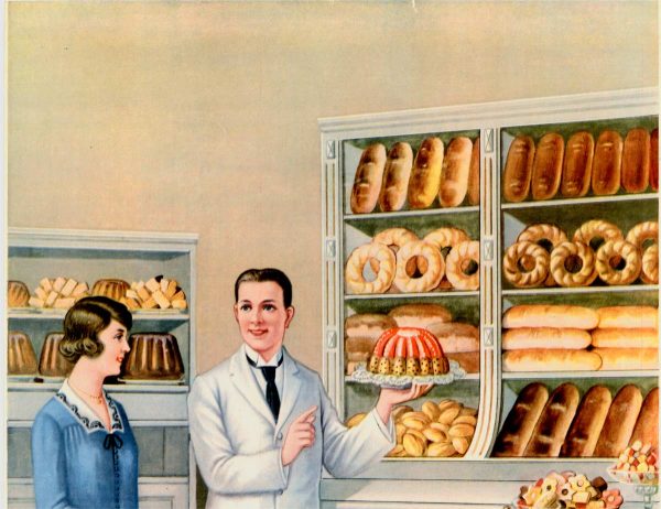 Warm chromolithograph depicting a turn-of-the-century German bakery interior with a cream and sage-green palette. A dapper male baker in a cream jacket and brown vest stands center-right, gesturing toward abundant wooden display cases stocked with golden-brown loaves, braided rolls, pastries, and elaborate cakes. A woman customer in a blue coat examines goods while two children peer upward in wonder. The shelving displays a taxonomy of baked goods—dense rye loaves, crusty baguettes, crescent rolls, ornate bundt cakes—rendered in warm ochres and burnt siennas. Lithographic color separation creates soft transitions and naturalistic flesh tones. The composition emphasizes abundance, craft, and the pride of the artisan baker. top panel