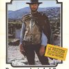 1964 French grande poster for A Fistful of Dollars, artist unknown, featuring Clint Eastwood standing in a frontier landscape with poncho and revolver, framed by a clean border with a yellow promotional text panel.