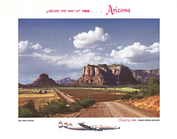 A desert road leads toward red rock formations under a blue sky with clouds, with a small illustrated airplane and “Arizona” text along the top and bottom.