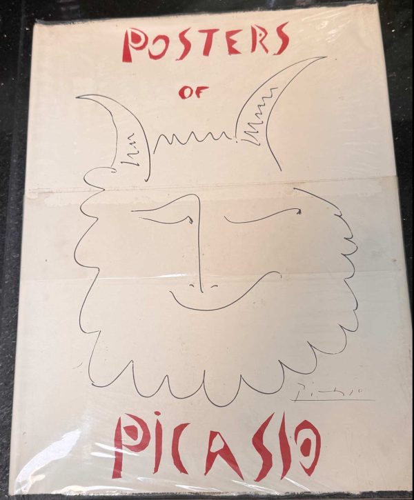 Vintage 1957 rare first edition hardcover book "The Posters of Picasso" featuring comprehensive archive of colorful exhibition posters, surrealist and modernist graphic designs by Pablo Picasso, collectible art reference volume