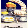 Vintage 1920s Butter-Nut Bread advertising poster featuring Art Deco table setting with golden toast, creamy butter in ornate dish, fried eggs on white plate, steaming coffee cup, deep navy blue background with decorative striped border, warm golden and orange color palette